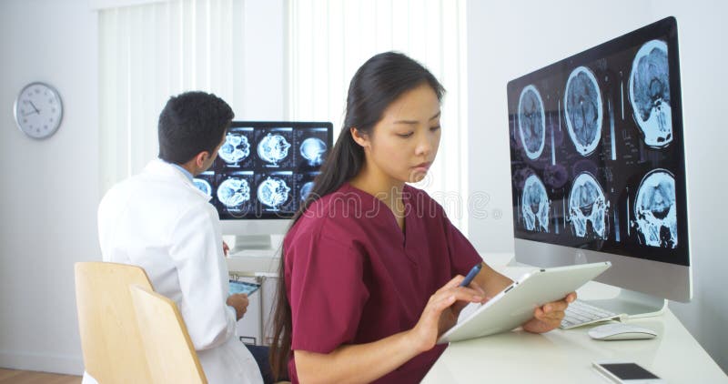 Multi-ethnic medical team working in the office