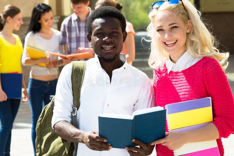 Multi-ethnic students outside stock photo