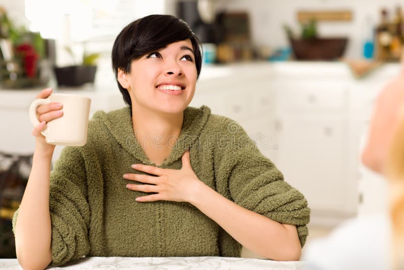 Multi-ethnic Young Woman Socializing with Friend