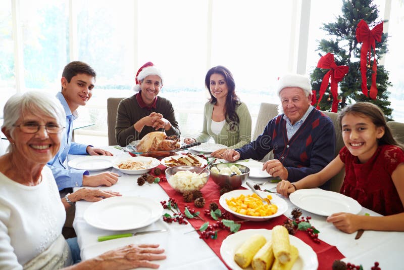 Family with Kids Having Christmas Dinner at Tree Stock Photo - Image of ...