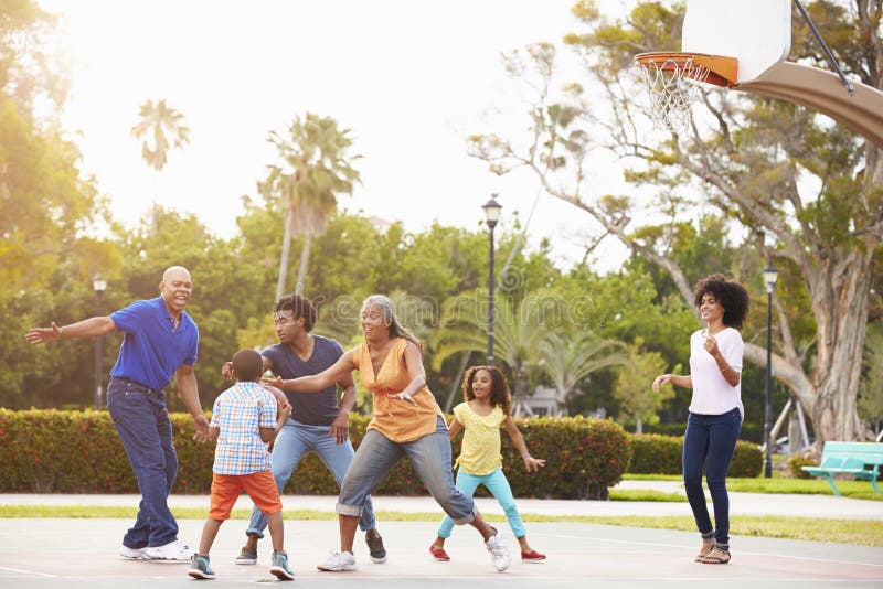 Multi Generation Family Playing Basketball Together Stock Image Image