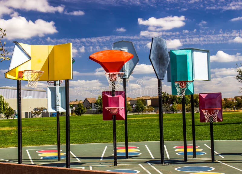 Multi Level Basket Ball Hoops at Local Playground Stock Photo Image