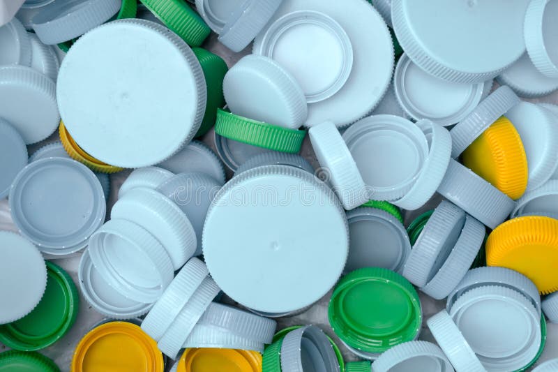 Multicolor plastic lids for recycling. close up. stock image