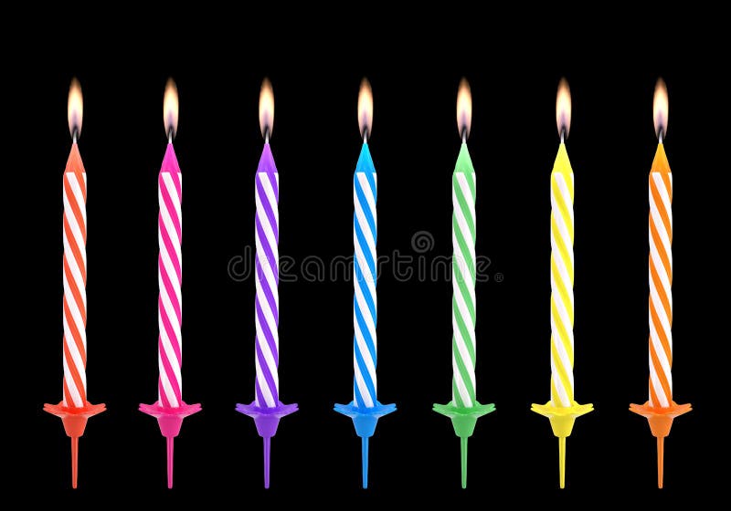 Multicolored birthdays candles isolated on black background