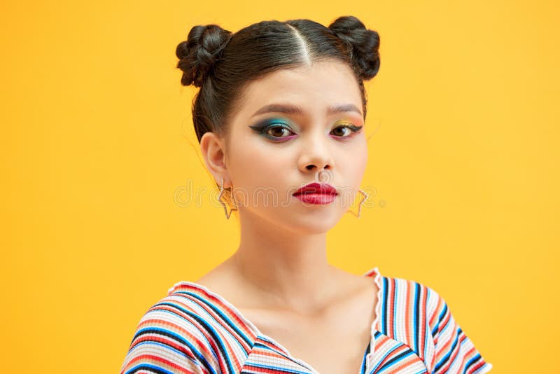 Multicolored creativity make-up. Close-up portrait of young beautiful woman