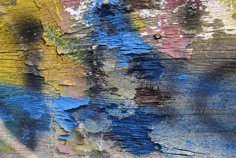 Multicolored Decaying Wood with Peeling Layers of Paint, Rusted Nails
