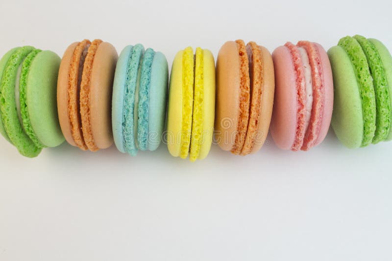 Macaroon Sweet Biscuits, French Pastries of Different Colors on a White ...