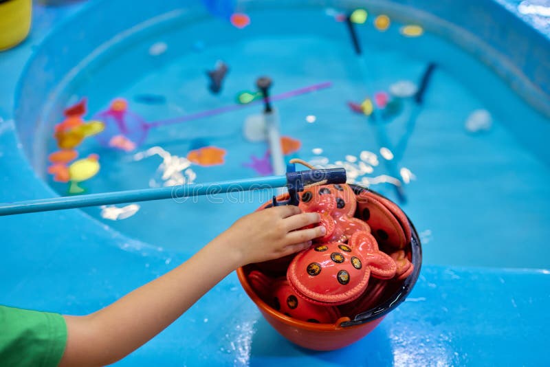 Multicolored Plastic Toy Fish in Pool for Children S Fishing, Concept Game.  Stock Photo - Image of play, paper: 247062194
