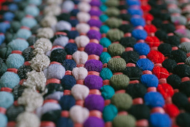 Multicolored rug texture and background for design. Close up of colorful abstract carpet. stock photography