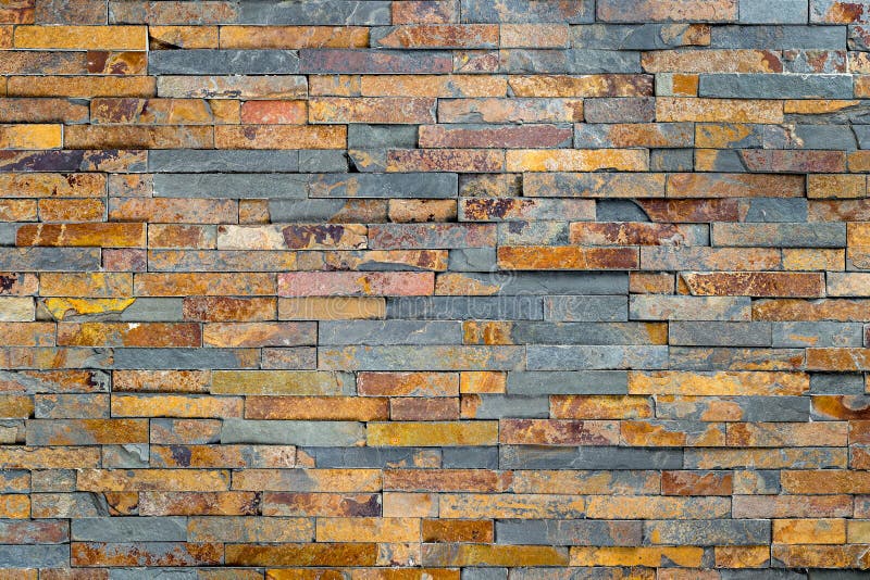 Multicolored slate stone rock background stock photo