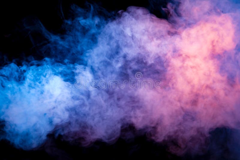 Multicolored smoke from a vape of blue and purple color of the strange mystical form on on a black isolated background. Bright clouds in the abstract form