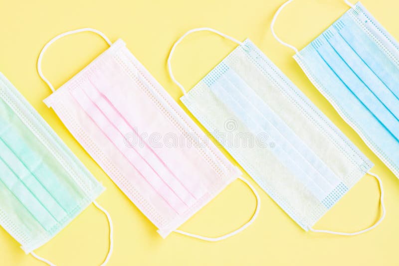 Multicolored Surgical Masks on Yellow Background Stock Photo Image of