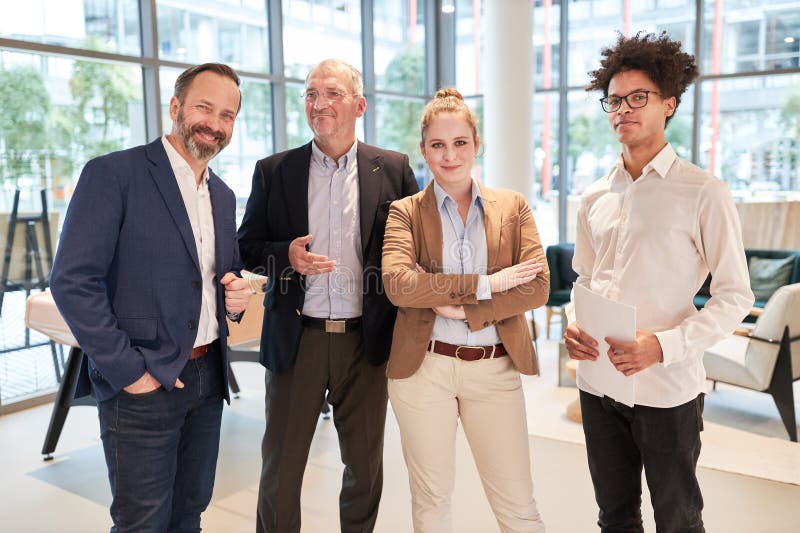 Multicultural competent business start-up team royalty free stock photography