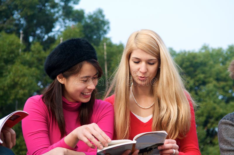 Multicultural girls studying in College stock photos Multicultural girls studying in College stock photos