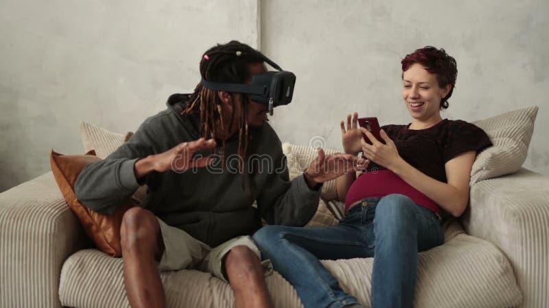 Multiethnic couple using new trends technology