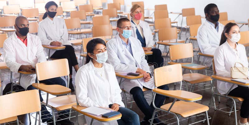 People listening to lecture at medical conference royalty free stock image
