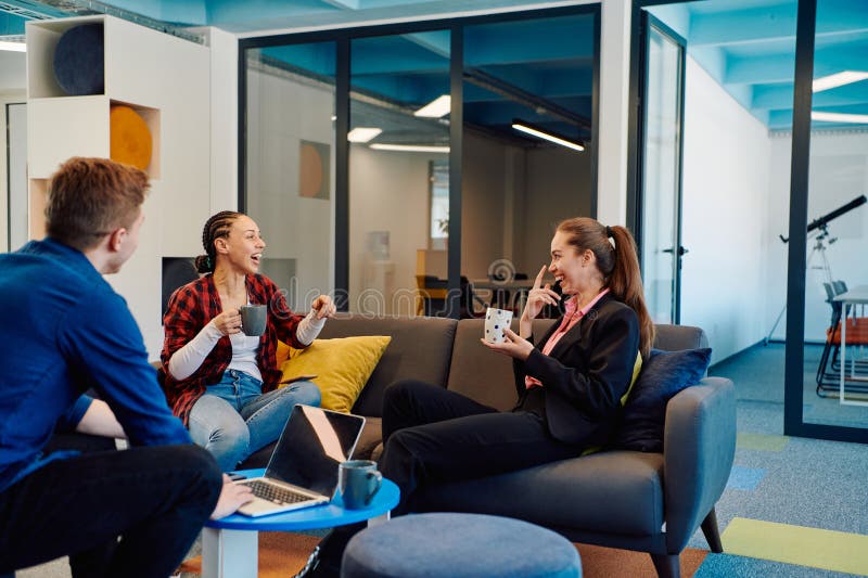 Multiethnic startup business team on meeting in a modern bright open space coworking office. Brainstorming, working on royalty free stock photos