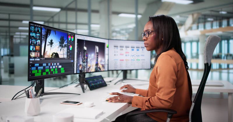 Multimedia Artist Crafts Dynamic Content On Editing Software stock photography