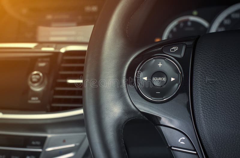 Multimedia Button on Multifunction Steering Wheel. Stock Photo