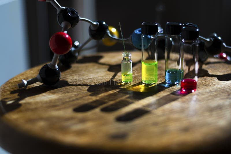 Multiple Colourful Close Up Photochemical Reaction in Glass Vial Under