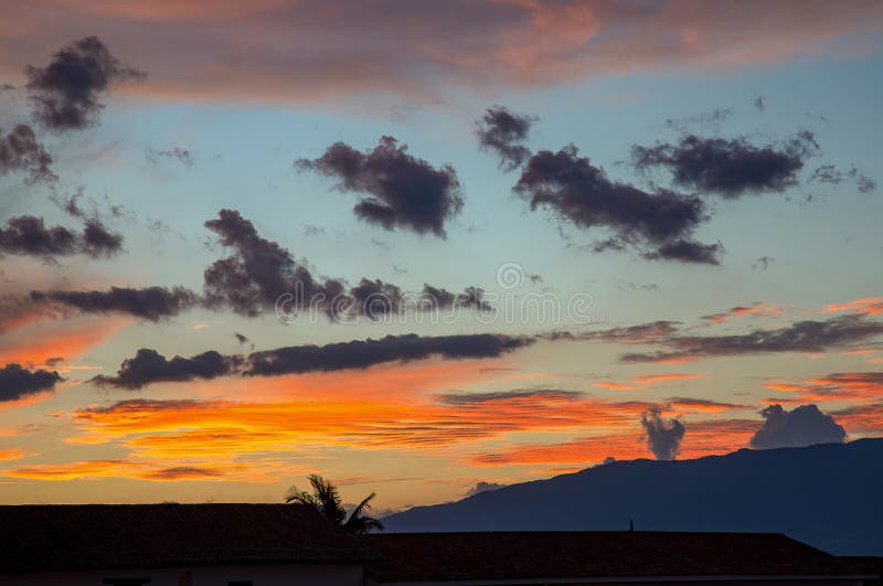 Little black clouds passing by stock photo