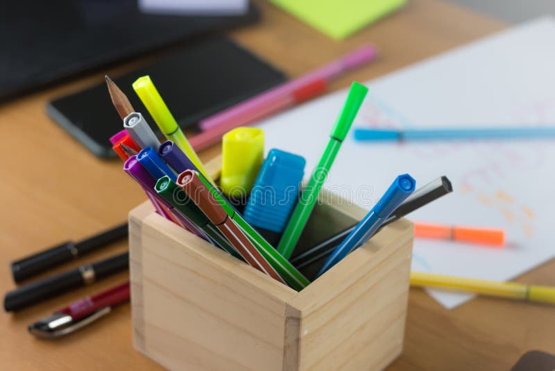 There pens on the table