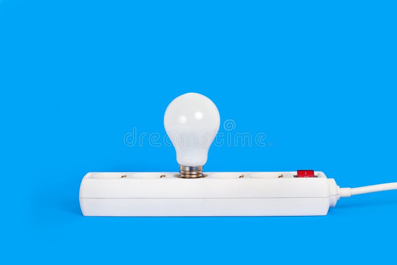 A Multiple Socket Base with a Light Bulb Stock Image - Image of socket