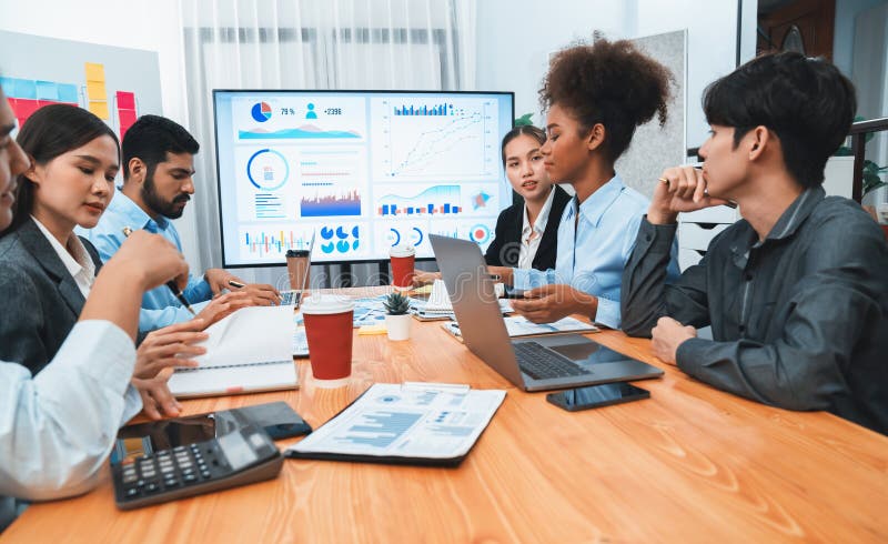 Multiracial analyst team use BI dashboard for data analysis. Concord stock photos