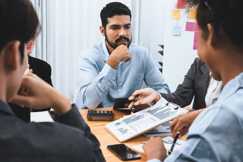 Multiracial analyst team use BI dashboard for data analysis. Concord stock photos