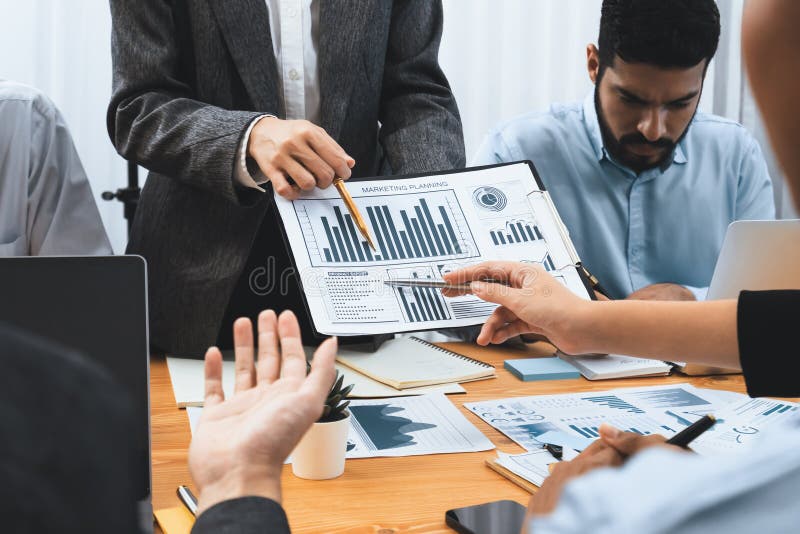 Multiracial analyst team use BI dashboard for data analysis. Concord stock photography