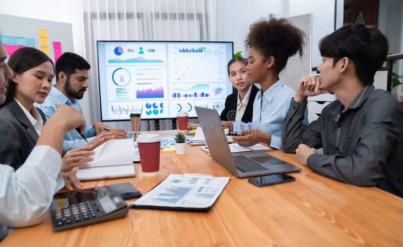 Multiracial analyst team use BI dashboard for data analysis. Concord stock photos