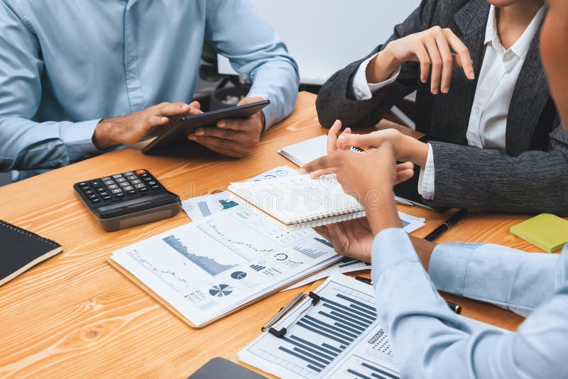 Multiracial analyst team use BI dashboard for data analysis. Concord stock photography