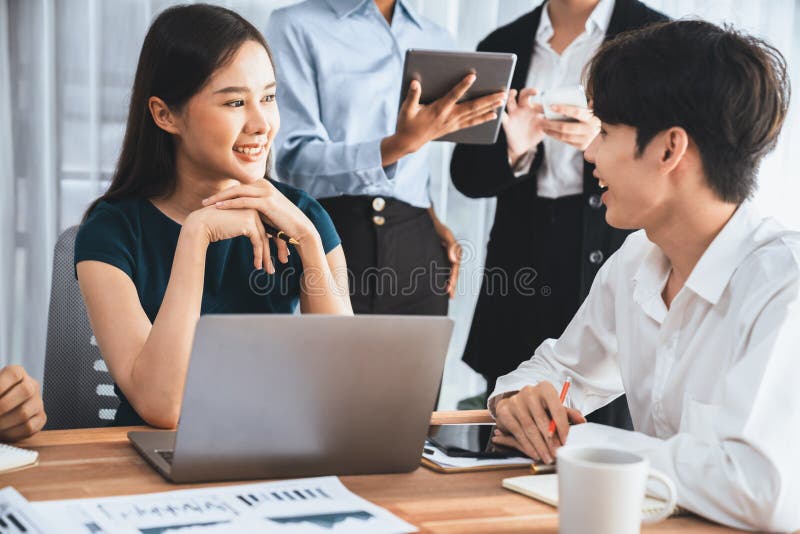 Multiracial analyst team use BI dashboard for data analysis with laptop. Concord royalty free stock images