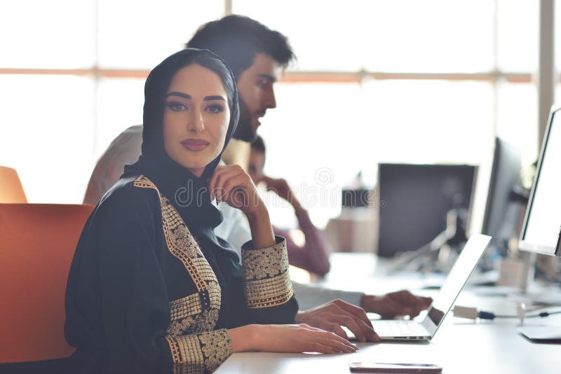 Multiracial contemporary business people working connected with technological devices like tablet and laptop stock photos Multiracial contemporary business people working connected with technological devices like tablet and laptop stock photos