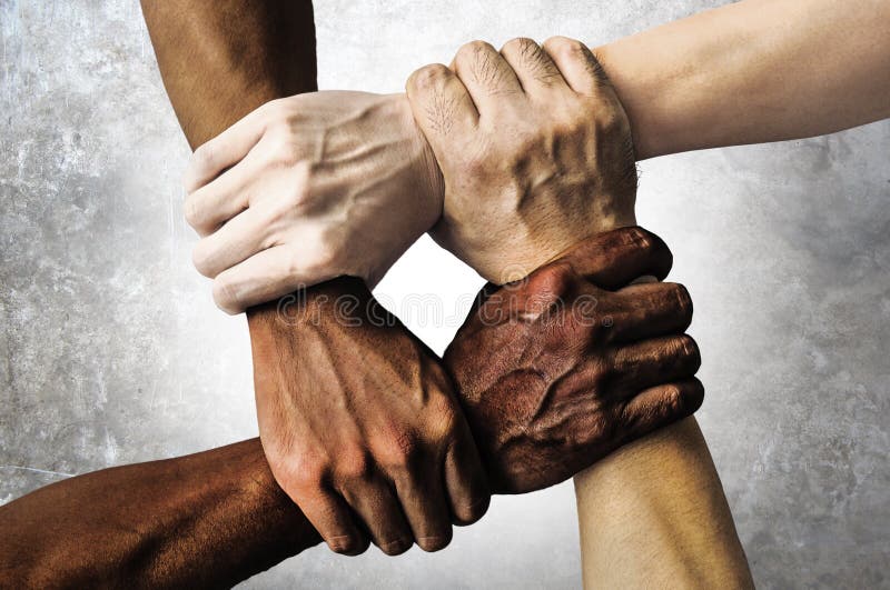 Multiracial group with black african American Caucasian and Asian hands holding each other wrist in tolerance unity love and anti stock photos