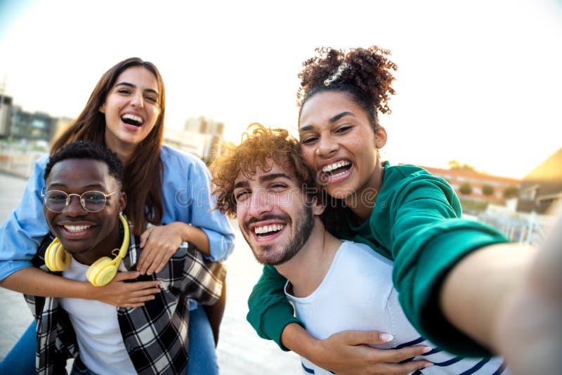 Multiracial Happy Friends Having Fun Taking Group Selfie Portrait On 