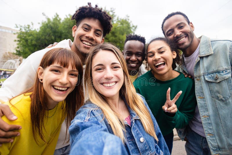 Multiracial Young Group Of People Taking Selfie Portrait On Travel 