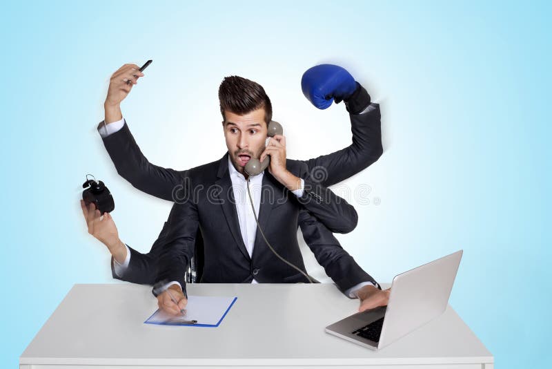 Multitasking business man with six arms royalty free stock image