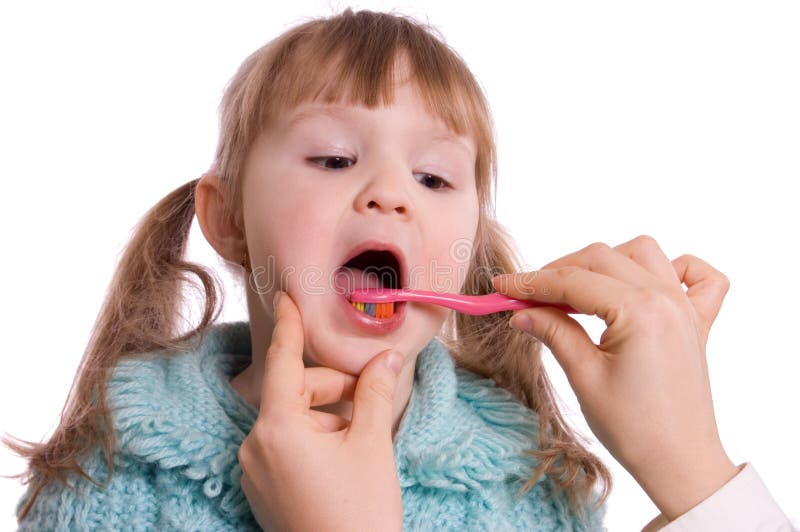 Mum cleans a teeth to a daughter