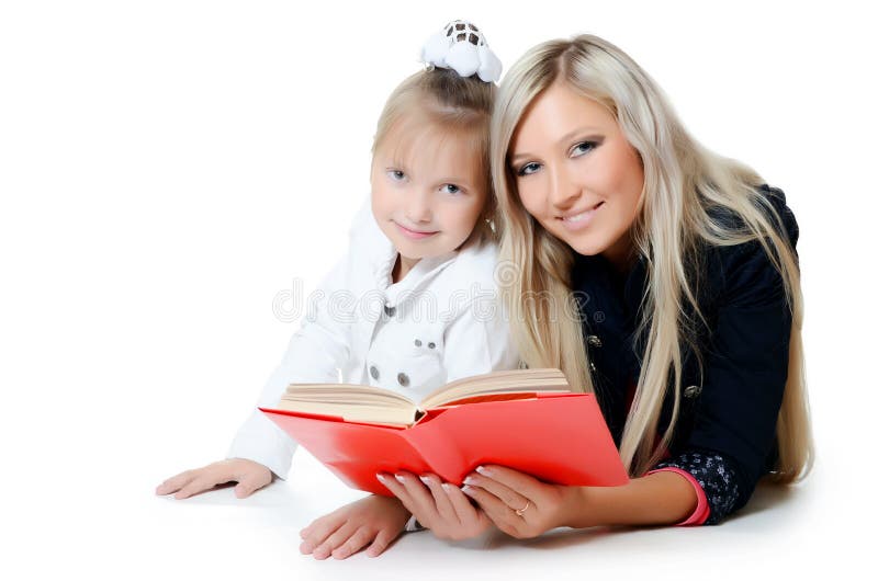 Mum with daughter read the book