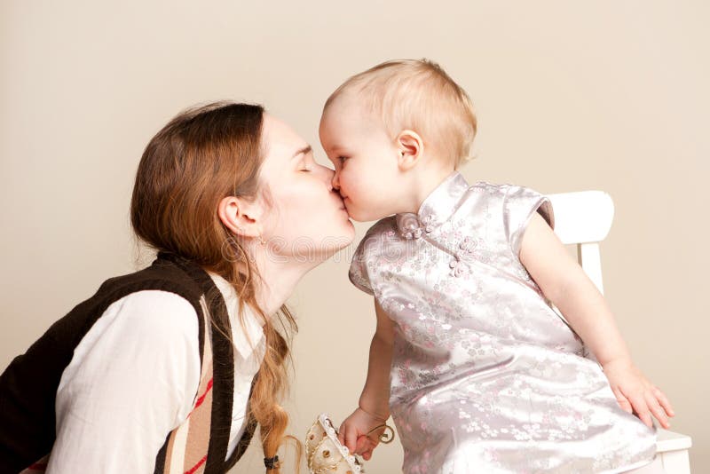 Mum Kisses The Small Daughter Maternal Love Stock Image Image Of