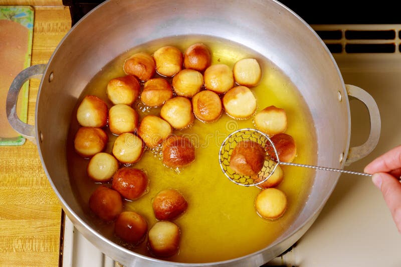 Munchkins Frying in Hot Oil in Deep Pan Stock Photo Image of food