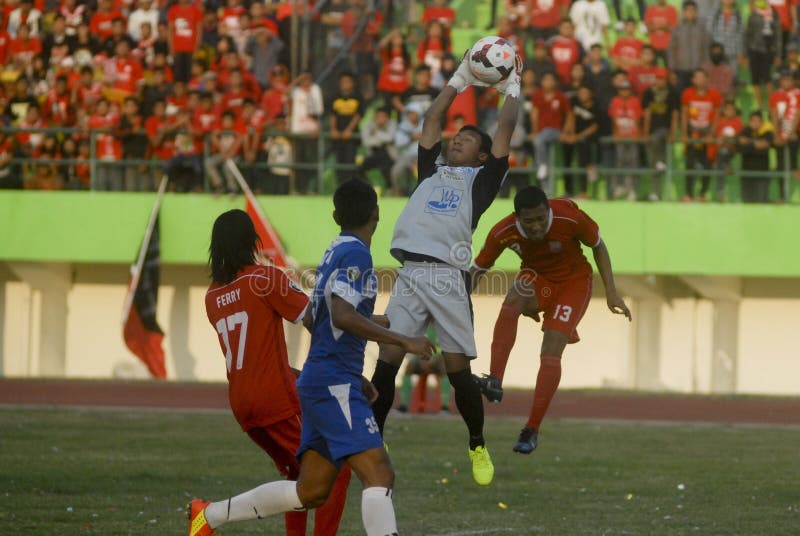 MUNDO INDONÉSIO INCÔMODO DO FUTEBOL imagem de stock MUNDO INDONÉSIO INCÔMODO DO FUTEBOL imagem de stock