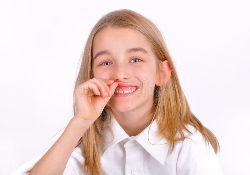 Oral hygiene - little girl opened her mouth and shows their teeth and gums. Oral hygiene - little girl opened her mouth and shows their teeth and gums.