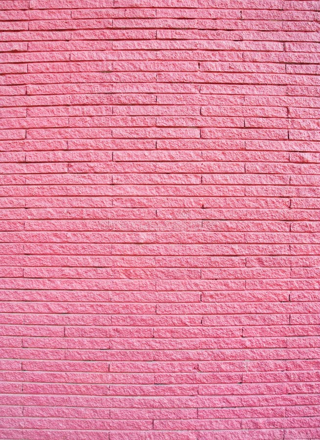 Mur de briques peint par rose