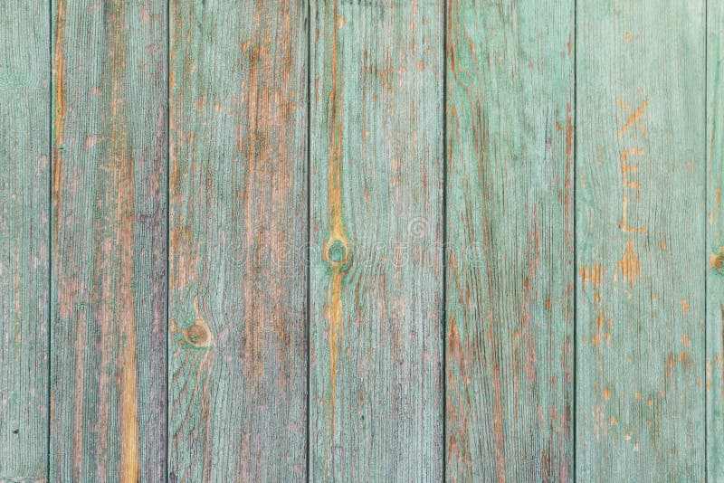 Shabby aquamarine colored wood wall background. Shabby aquamarine colored wood wall background