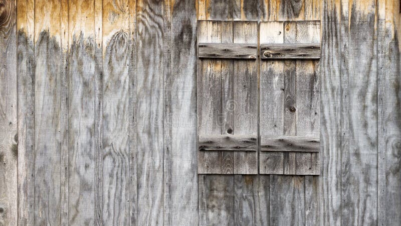 Mur en bois rustique de grange avec le fond de volets photo stock Mur en bois rustique de grange avec le fond de volets photo stock