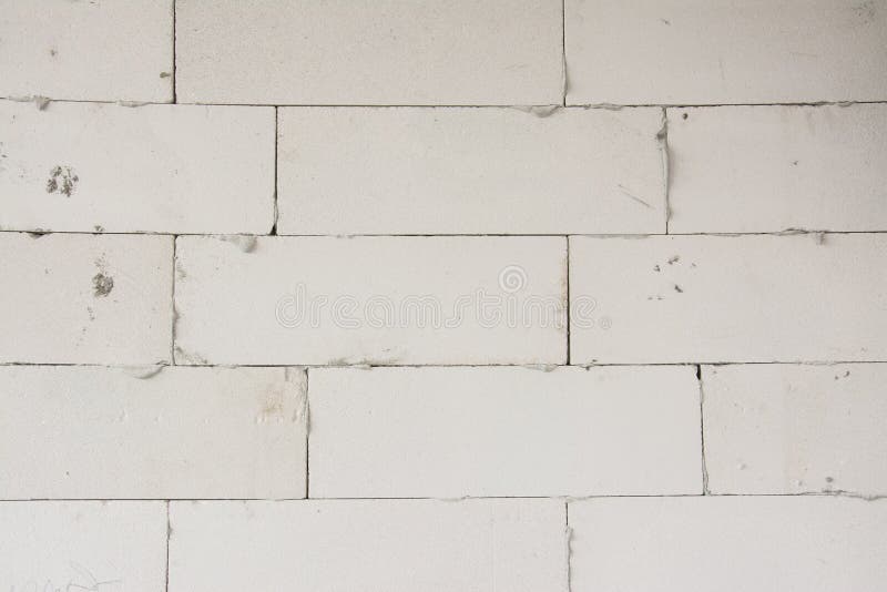 Mur léger blanc de bloc de béton photographie stock libre de droits Mur léger blanc de bloc de béton photographie stock libre de droits