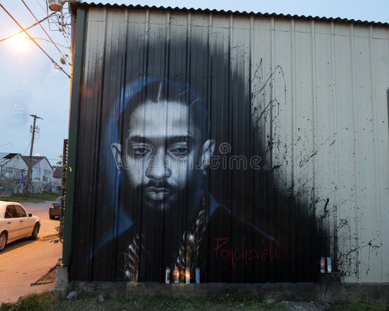 Mural featuring Nipsey Hussle by Ponchaveli in Dallas, Texas