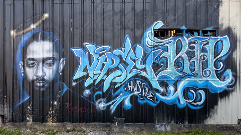 Mural featuring Nipsey Hussle by Ponchaveli in Dallas, Texas. Pictured is a mural featuring Nipsey Hussle by renowned mural artist Ponchaveli in Dallas, Texas